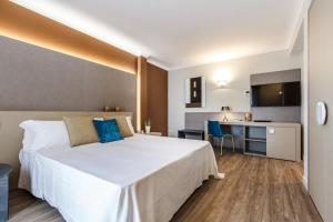 Voodi või voodid majutusasutuse Seawater Hotel Bio & Beauty Spa toas