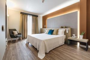 Voodi või voodid majutusasutuse Seawater Hotel Bio & Beauty Spa toas