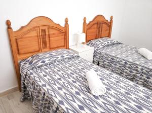 Ein Bett oder Betten in einem Zimmer der Unterkunft Sol Alcúdia 46