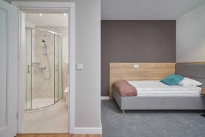 Kúpeľňa v ubytovaní Apartamenty Queen