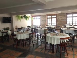 En restaurant eller et andet spisested på Hotel Villa Souza Ltda