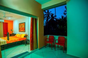 Trivandrum şehrindeki Vasudevam Premium Suites tesisine ait fotoğraf galerisinden bir görsel