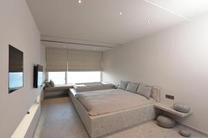Кровать или кровати в номере Hotel King Saron Club Marmara