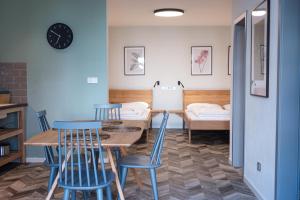 Posteľ alebo postele v izbe v ubytovaní ART Hostel & Apartments
