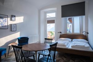 Posteľ alebo postele v izbe v ubytovaní ART Hostel & Apartments
