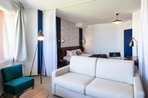 Posezení v ubytování Baya Hotel