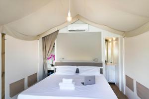 hu Firenze Camping in Town客房内的一张或多张床位