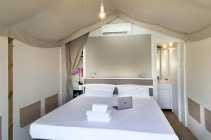 hu Firenze Camping in Town客房内的一张或多张床位
