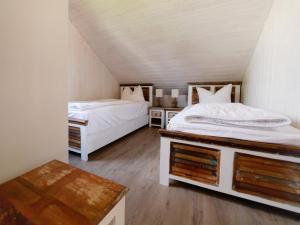 
Ein Bett oder Betten in einem Zimmer der Unterkunft Ferienpark Scharmützelsee
