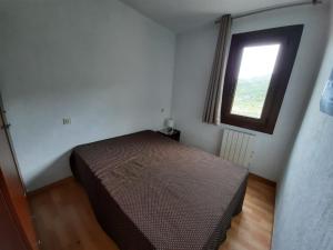 Postel nebo postele na pokoji v ubytování Altissim Grizzly