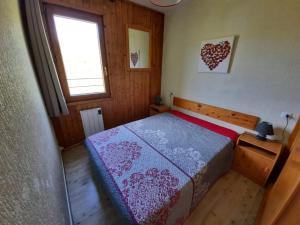 Postel nebo postele na pokoji v ubytování Altissim Grizzly