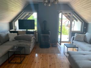 Posezení v ubytování Apartamenty Jarzębinowa 17