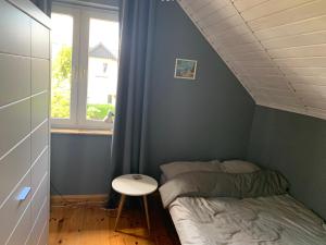 Postel nebo postele na pokoji v ubytování Apartamenty Jarzębinowa 17