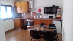 A cozinha ou kitchenette de Meimoa Guesthouse