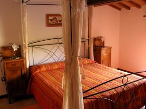 Un ou plusieurs lits dans un hébergement de l'établissement Agriturismo Villa Rancio