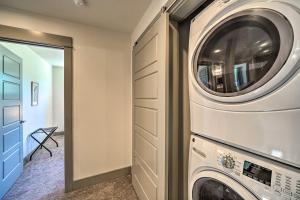 a laundry room with a washer and dryer at Bozeman Home with Deck Walk to Fishing, Hot Springs in Bozeman