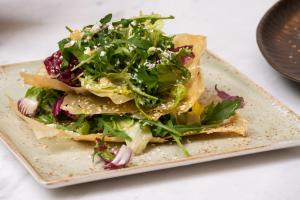 a plate of food with a salad on it at Marpessa Hotel & Spa in Agrinion