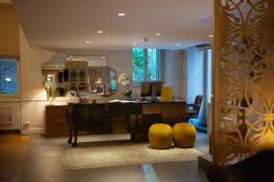 a living room with a sink and a counter at Marpessa Hotel & Spa in Agrinion