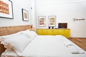 Cama o camas de una habitación en Aris Athens Suites