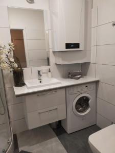 A bathroom at Apartament -Sweet Home