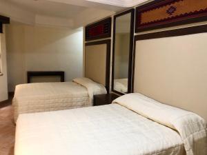 Hostal Nordés客房内的一张或多张床位