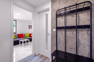Łóżko lub łóżka w pokoju w obiekcie Apartmán B Harrachov