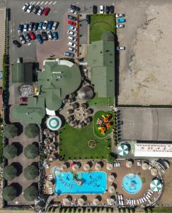 an overhead view of a park with a pool at Motel pizzeria Actros in Nova Topola