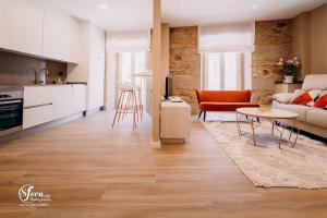 Kuchyňa alebo kuchynka v ubytovaní Apartamentos Rúa Vella
