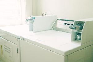 a laundry room with a washer and dryer at Little Tokyo Hotel in Los Angeles