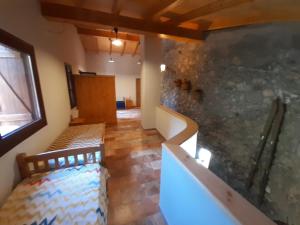 Posteľ alebo postele v izbe v ubytovaní Casa del Pont