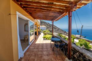 a balcony with a view of the ocean at Villa Puerto Naos in Puerto Naos