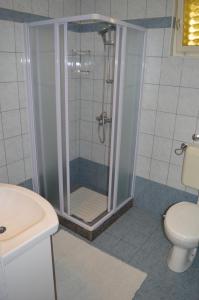 Kúpeľňa v ubytovaní Rooms & Apartments Kvasić