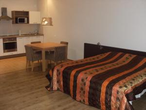 Kuchyň nebo kuchyňský kout v ubytování Litrada Apartments
