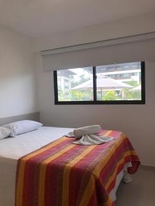 Ένα ή περισσότερα κρεβάτια σε δωμάτιο στο Cupe Beach Living Flat