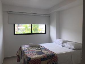 Ένα ή περισσότερα κρεβάτια σε δωμάτιο στο Cupe Beach Living Flat