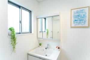 Koupelna v ubytování Yokkaichi Hazunaka Hotel + 37 fotografií