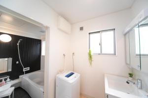Un baño de Yokkaichi Hazunaka Hotel