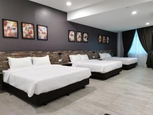 Voodi või voodid majutusasutuse L Hotel toas
