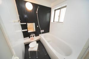 Un baño de Yokkaichi Hazunaka Hotel