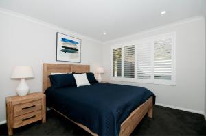 En eller flere senge i et værelse på Peaceful Ridge Resort