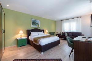 Postel nebo postele na pokoji v ubytování SUNOLUS VINEYARDHOUSe + 37 fotografií