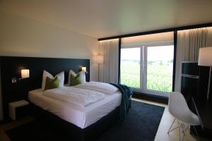 Voodi või voodid majutusasutuse FÜ Hotel by WMM Hotels toas