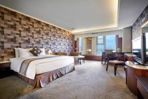 Postel nebo postele na pokoji v ubytování Zhong Ke Hotel