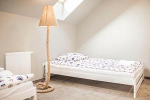 Postel nebo postele na pokoji v ubytování Hostel pod Cisem