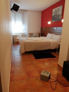 Posteľ alebo postele v izbe v ubytovaní Hotel Cuéntame