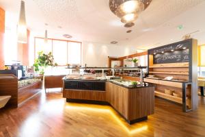 Business Hotel Ambio Gleisdorf的休息区