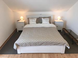Postel nebo postele na pokoji v ubytování VIP Apartments & Room