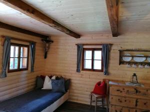 Łóżko lub łóżka w pokoju w obiekcie Ampferkaralm Hütte