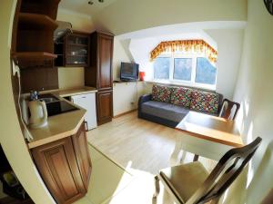 Kuchyňa alebo kuchynka v ubytovaní Apartament 506 Krynica Zdrój Centrum