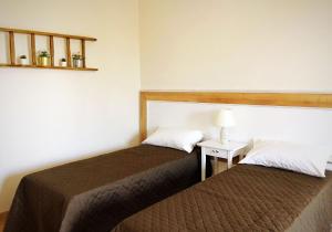 Posteľ alebo postele v izbe v ubytovaní Agriturismo Casale Cerere